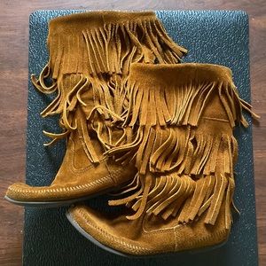 Cognac Minnetonka 3 Tiered moccasin boots.